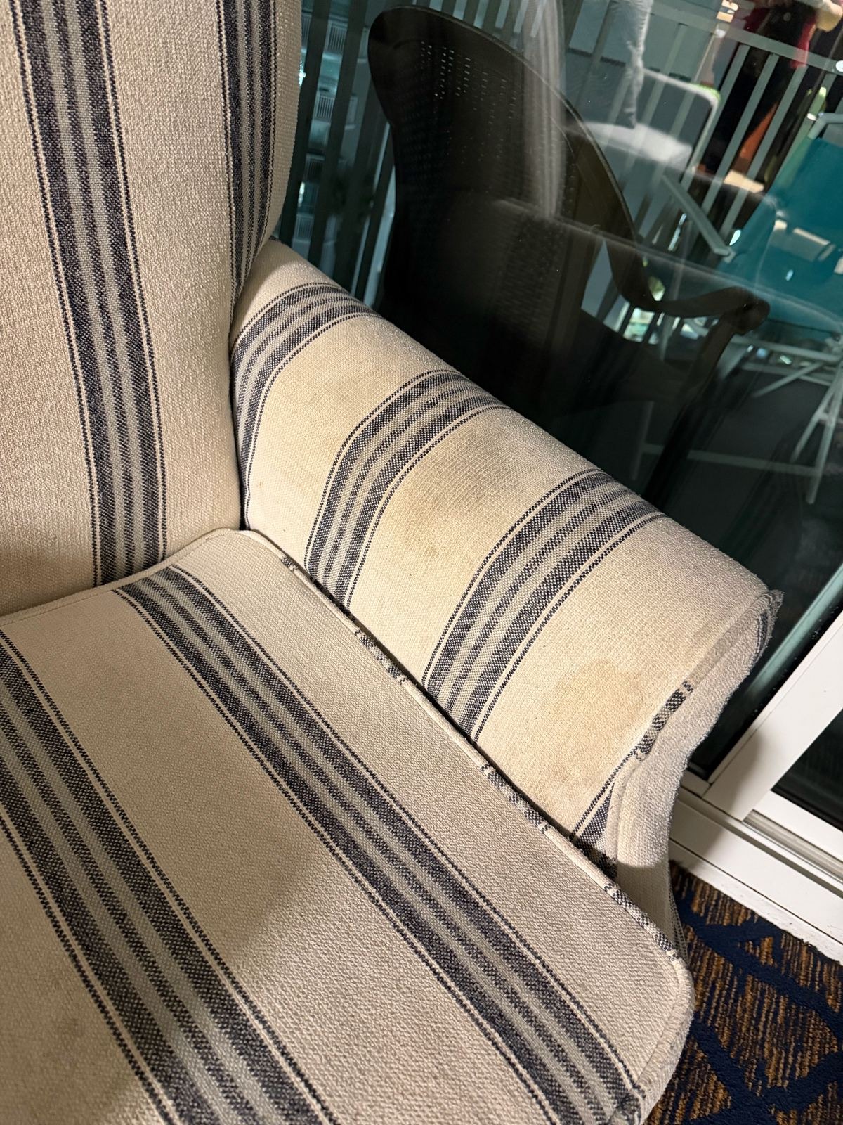 Close-up of stains on the armchair armrest